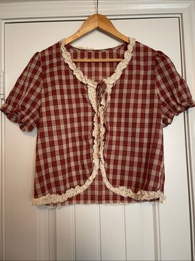 Women's red and white gingham crop top with lace trim.  Size L